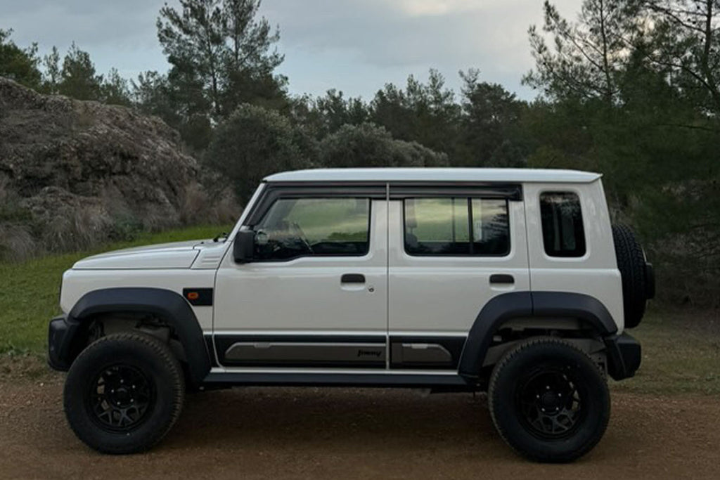 white Suzuki Jimny 5-door Fitted with Magpie M-01 Wheels and Various Accessories