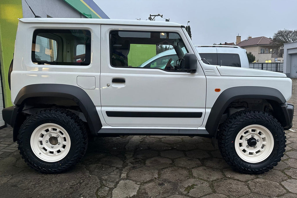 White Suzuki Jimny fitted with Vintage White High Peak J-01 Wheels