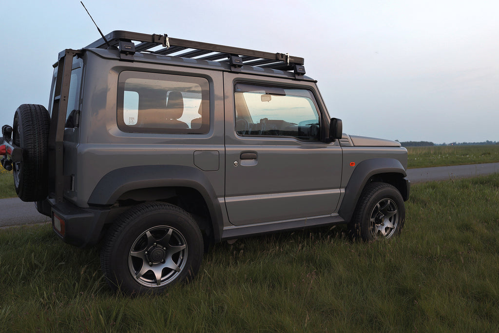 Suzuki Jimny (2018+) with HIGH PEAK J-02 15" wheels, Front Runner Slimline II Roof Rack and Ladder