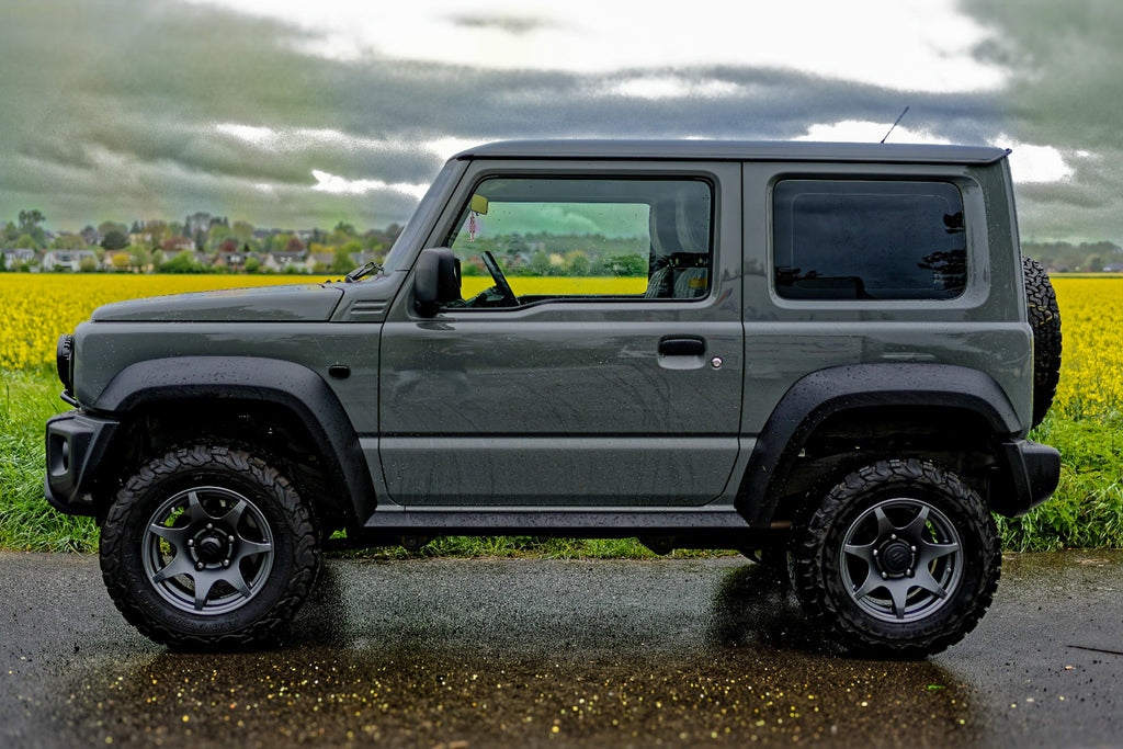 Suzuki Jimny (2018+) with HIGH PEAK J-02 15 inch wheels with a Retro Front Grille and JimnyStyle Smoked LED Lights and other accessories from Street Track Life JimnyStyle