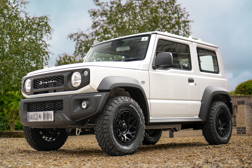 White Suzuki Jimny fitted with Satin Black Magpie M-01 Wheels